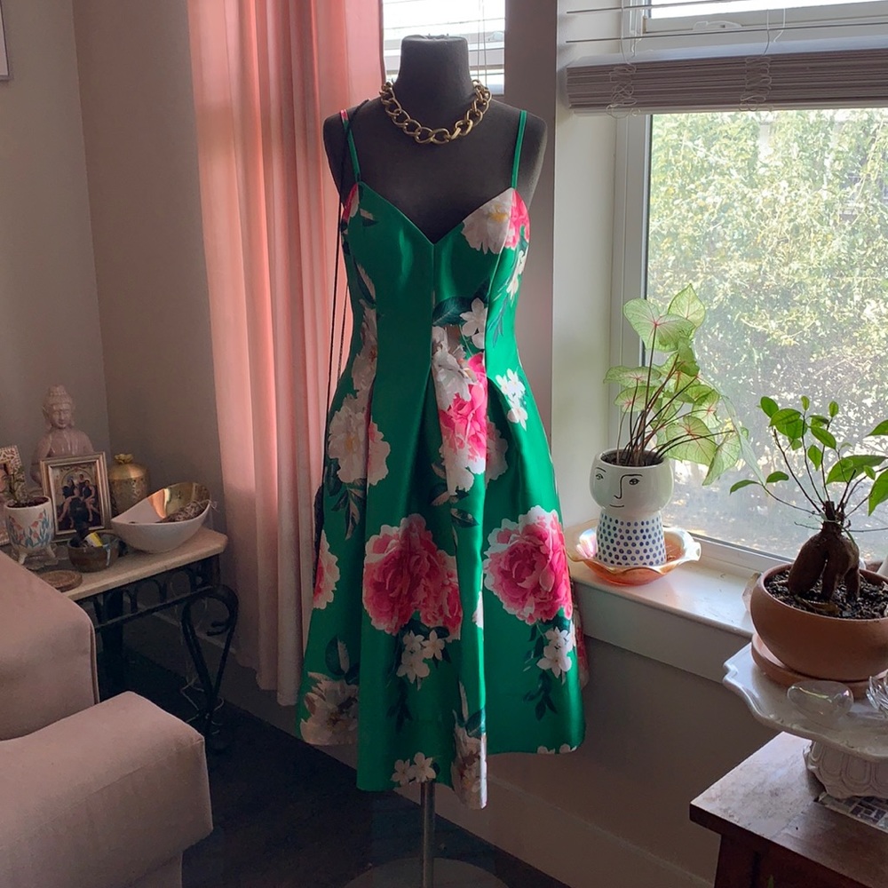 Green floral cocktail dress.
